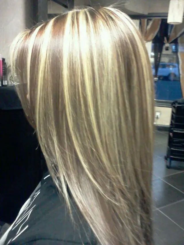 Blonde highlights through straight brown hair